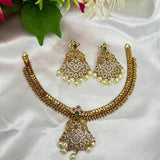 Traditional temple-style short necklace with rich antique gold polish.