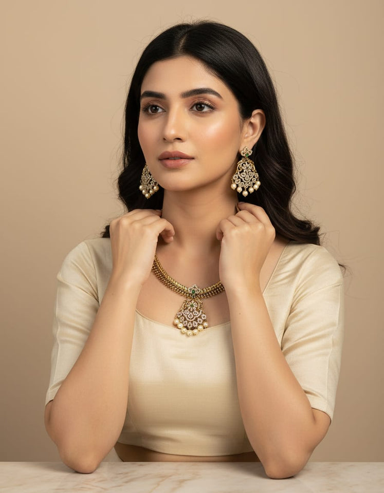 Traditional temple-style short necklace with rich antique gold polish.